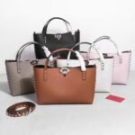 شنطة نسائية جلد بني فاخرة مزينة بمسامير ذهبية – تصميم أنيق كروس وكتف